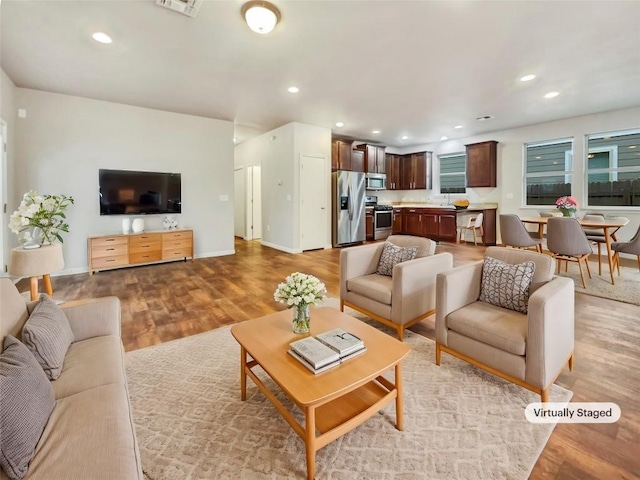 living room featuring light hardwood / wood-style flooring