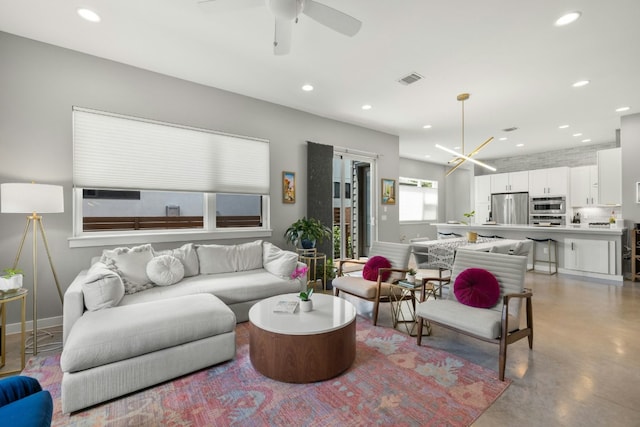 living room with ceiling fan