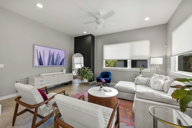 living room featuring ceiling fan