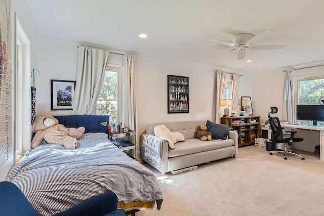 carpeted bedroom featuring ceiling fan