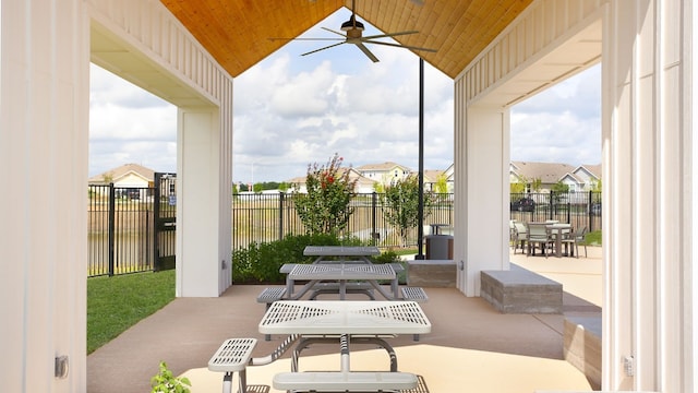 view of patio featuring ceiling fan