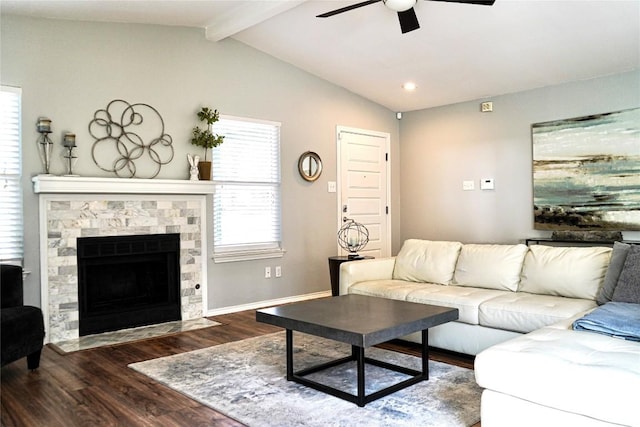 living room featuring ceiling fan, dark wood-type flooring, and lofted ceiling with beams