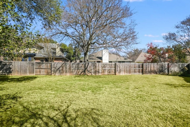 view of yard with fence