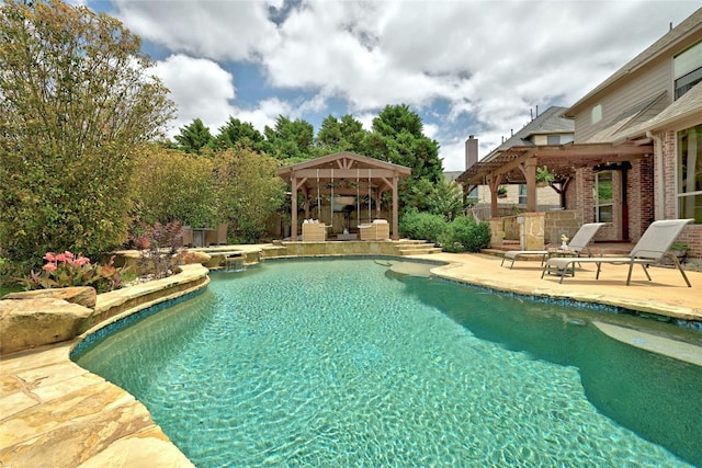 pool featuring a gazebo and a patio