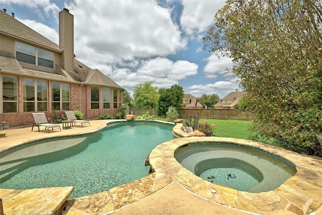 view of swimming pool with a fenced in pool, an in ground hot tub, a fenced backyard, and a patio