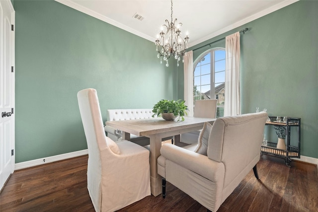 dining space featuring dark wood-style flooring, crown molding, baseboards, and visible vents