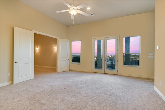 205 Palazza Alto Dr, Austin, TX 78734 - unfurnished room featuring light colored carpet, french doors, a ceiling fan, and baseboards