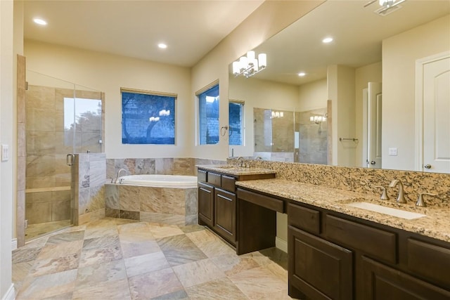 205 Palazza Alto Dr, Austin, TX 78734 - bathroom featuring double vanity, a garden tub, a stall shower, and recessed lighting