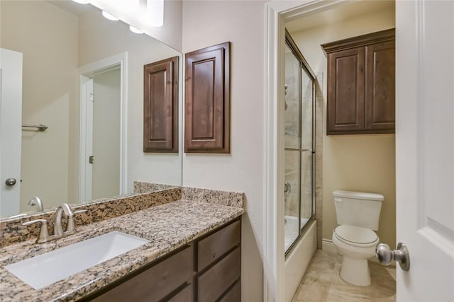 205 Palazza Alto Dr, Austin, TX 78734 - bathroom featuring toilet, vanity, and bath / shower combo with glass door