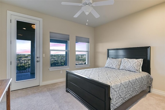 205 Palazza Alto Dr, Austin, TX 78734 - bedroom featuring light carpet, access to outside, baseboards, and a ceiling fan