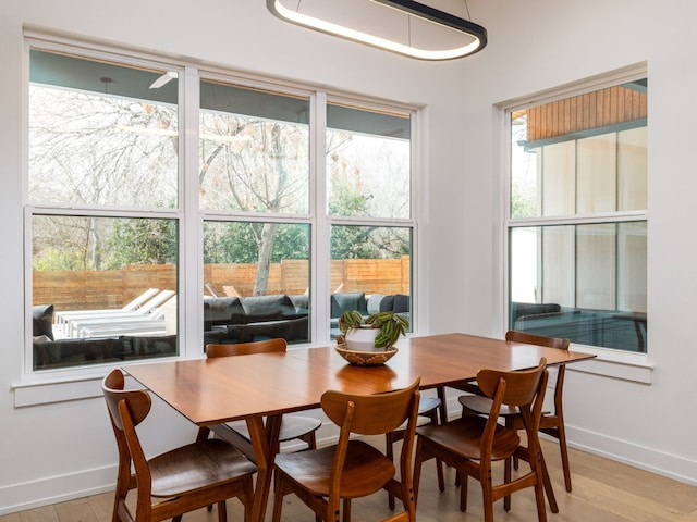 dining area featuring light wood-type flooring