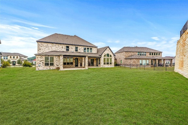 2324 Bel Paese Bnd, Leander, TX 78641 - rear view of house featuring a patio and brick siding
