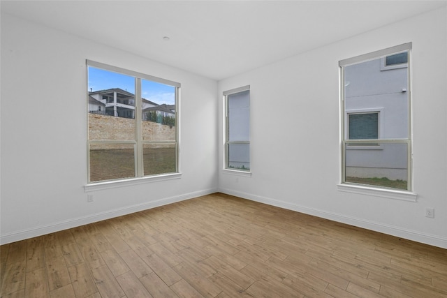 2324 Bel Paese Bnd, Leander, TX 78641 - empty room with wood finished floors