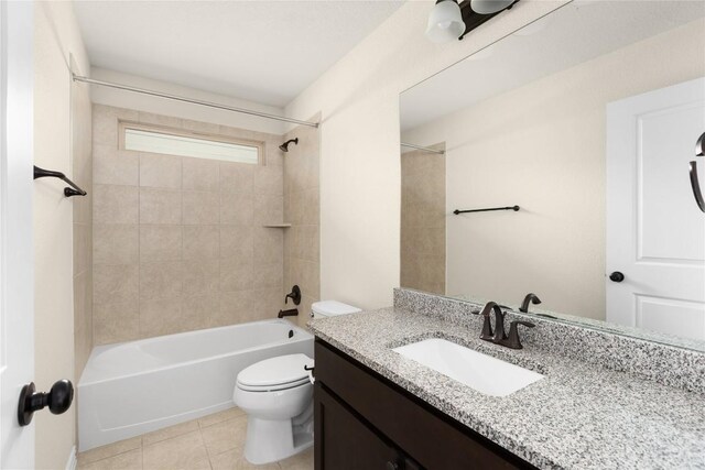 4131 Van Ness Ave, Round Rock, TX 78681 - bathroom with tile patterned floors, toilet, vanity, and shower / tub combination