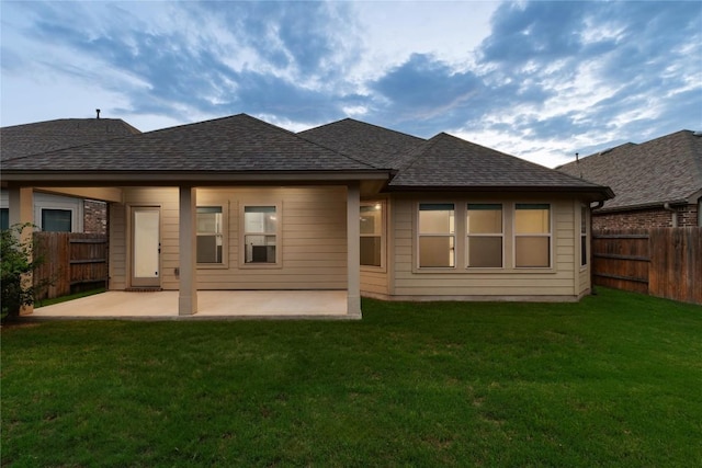 4131 Van Ness Ave, Round Rock, TX 78681 - back of property featuring a fenced backyard, a patio, and roof with shingles