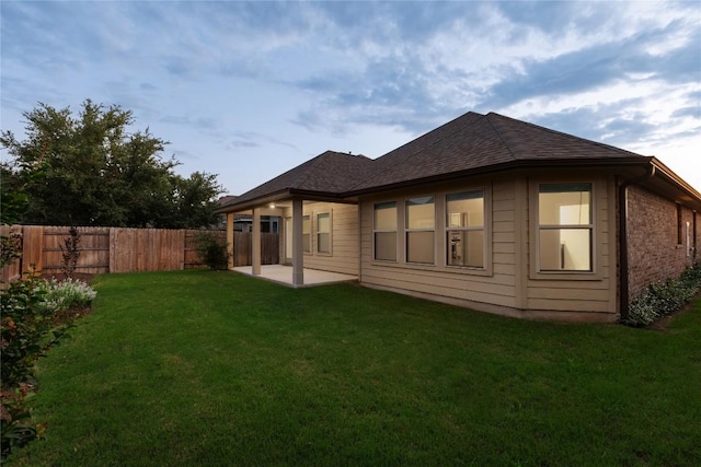 4131 Van Ness Ave, Round Rock, TX 78681 - rear view of house featuring a patio area and roof with shingles