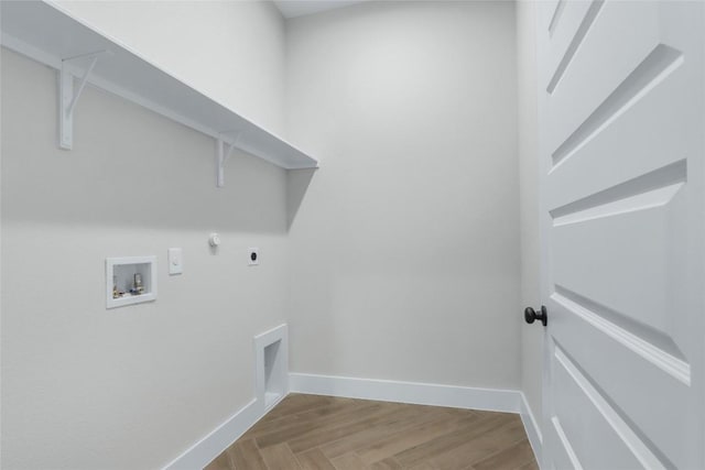 laundry room featuring electric dryer hookup, light wood-style floors, laundry area, and washer hookup