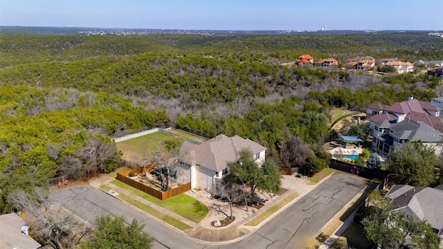 aerial view with a forest view and a residential view