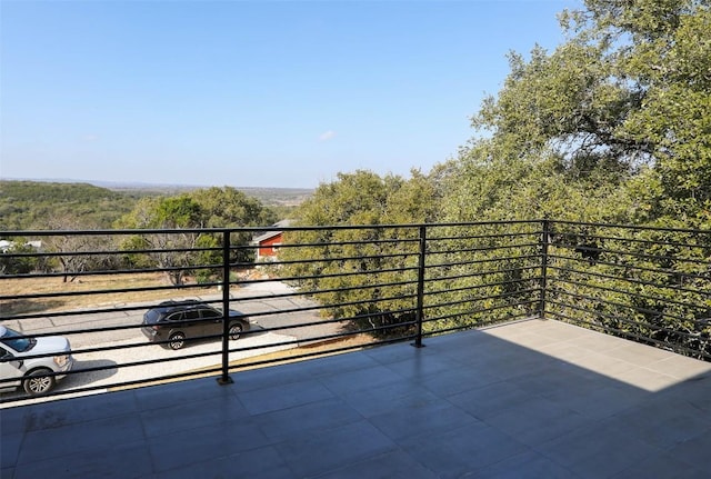 balcony with a view of trees