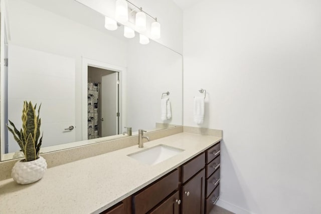 8901 Parker Ranch Cir Unit A, Austin, TX 78748 - full bathroom with vanity, baseboards, and a shower with shower curtain