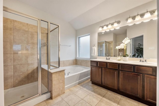 3541 Guadalajara St, Round Rock, TX 78665 - full bathroom featuring tile patterned flooring, a stall shower, a garden tub, and double vanity