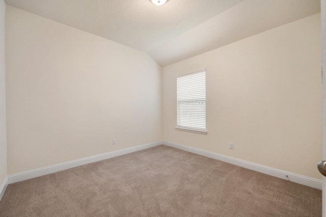 3541 Guadalajara St, Round Rock, TX 78665 - unfurnished room with light carpet and lofted ceiling