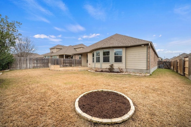 3541 Guadalajara St, Round Rock, TX 78665 - back of house featuring a patio area, a fenced backyard, and roof with shingles