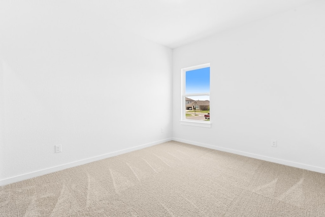 512 Palatino Bnd, Liberty Hill, TX 78642 - empty room featuring light carpet and baseboards