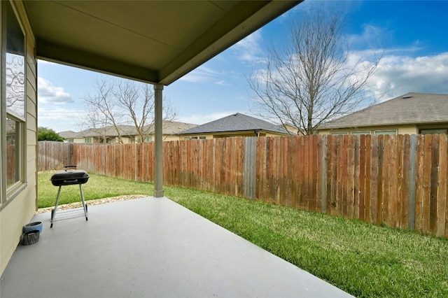 view of patio / terrace featuring grilling area and a fenced backyard