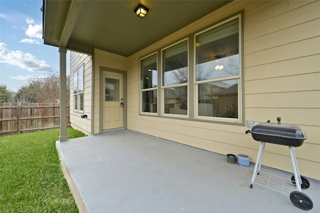 view of patio / terrace with fence