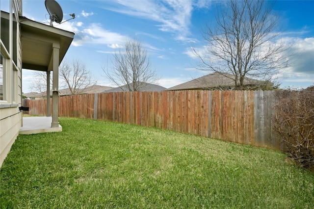 view of yard featuring a fenced backyard