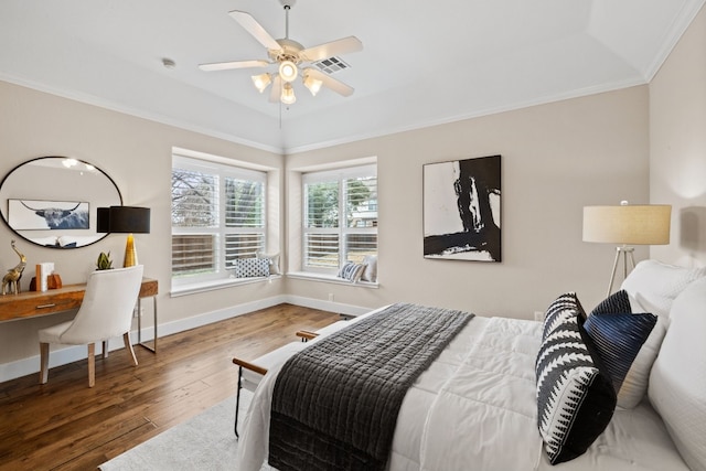 8112 Cobblestone, Austin, TX 78735 - bedroom with ornamental molding, wood finished floors, baseboards, a tray ceiling, and a ceiling fan