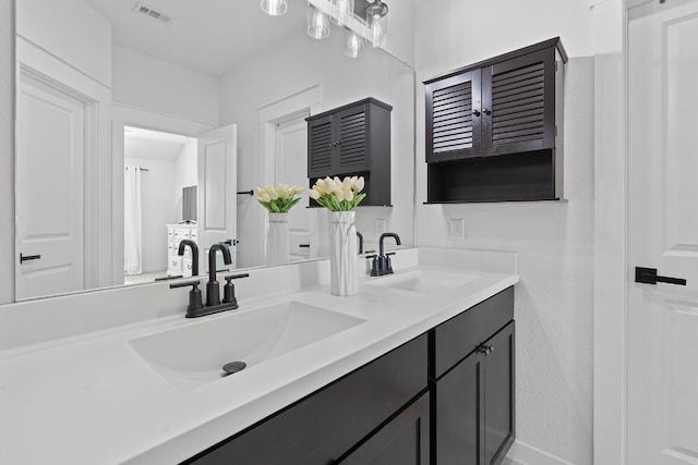 full bathroom with double vanity