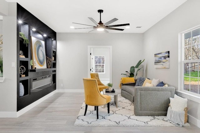 137 Puu Waa Waa Ln, Bastrop, TX 78602 - living area with ceiling fan, wood finished floors, and recessed lighting