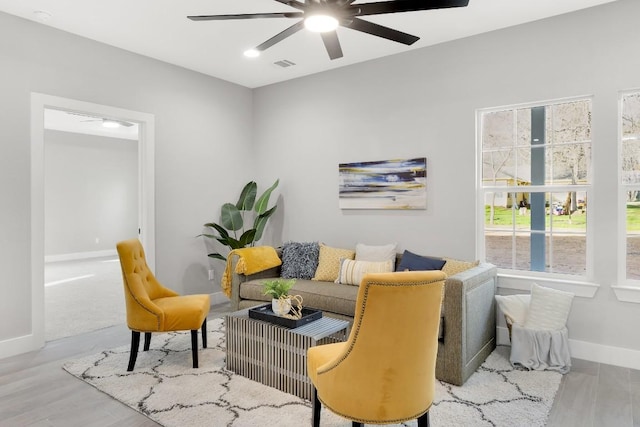 137 Puu Waa Waa Ln, Bastrop, TX 78602 - living area with ceiling fan and wood finished floors