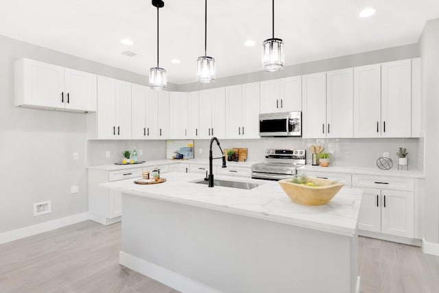 137 Puu Waa Waa Ln, Bastrop, TX 78602 - kitchen with electric range, white microwave, decorative backsplash, light wood-style flooring, and recessed lighting