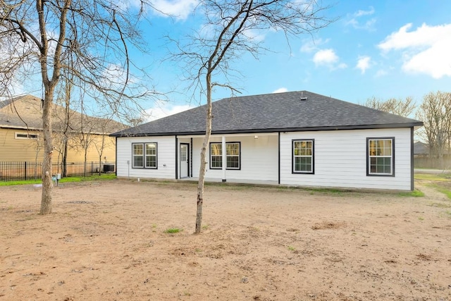 137 Puu Waa Waa Ln, Bastrop, TX 78602 - rear view of house with a shingled roof