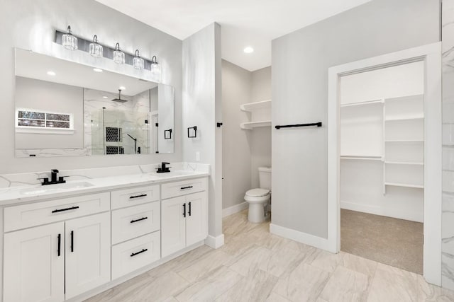 137 Puu Waa Waa Ln, Bastrop, TX 78602 - bathroom featuring a marble finish shower, double vanity, a walk in closet, and marble finish flooring