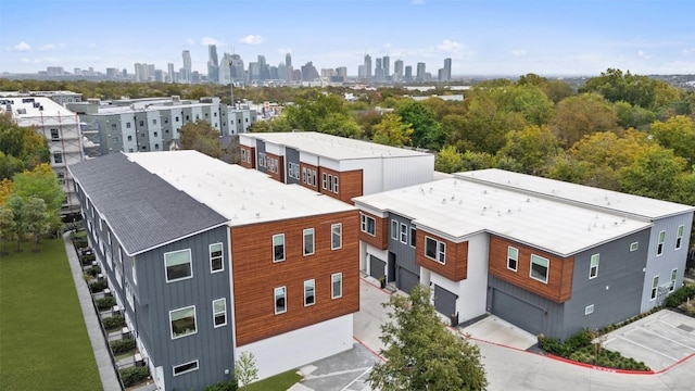 drone / aerial view featuring a city view