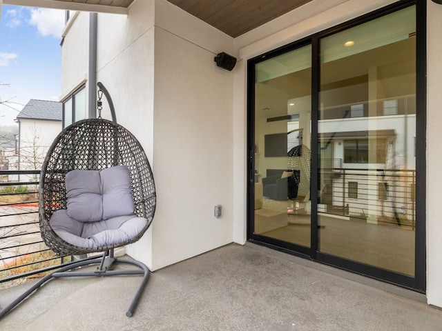 view of patio / terrace with a balcony