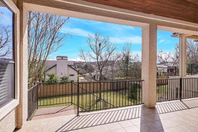 view of patio with a balcony