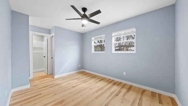 1112 Village Green Dr, Austin, TX 78753 - unfurnished bedroom with wood finished floors and baseboards