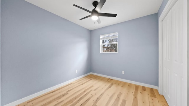 1112 Village Green Dr, Austin, TX 78753 - empty room with wood finished floors, baseboards, and ceiling fan