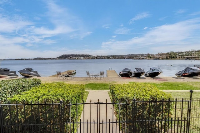 view of water feature with fence