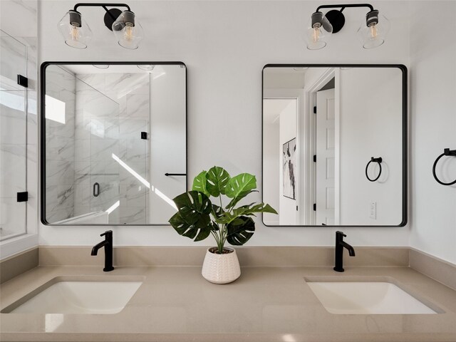 1002 Gullett St Unit 2, Austin, TX 78702 - bathroom with a marble finish shower and double vanity