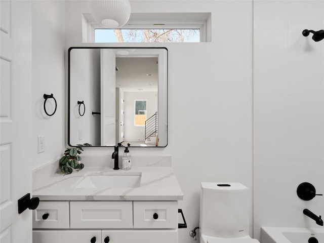 1002 Gullett St Unit 2, Austin, TX 78702 - bathroom with vanity, toilet, and bathing tub / shower combination