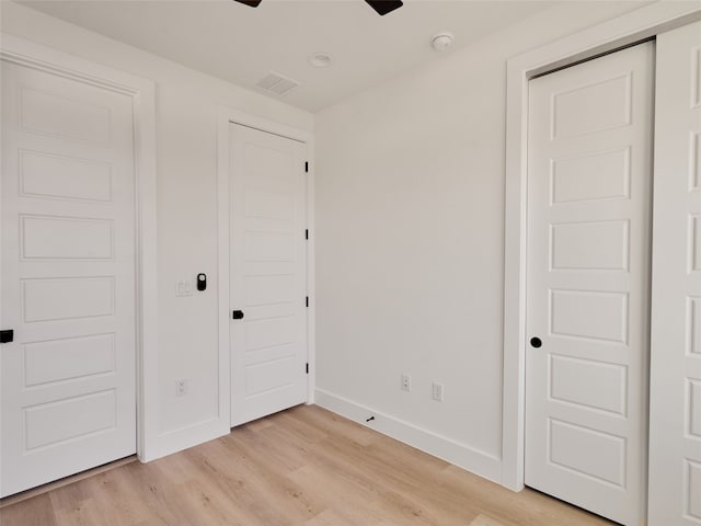 1002 Gullett St Unit 2, Austin, TX 78702 - unfurnished bedroom with light wood-style floors, baseboards, and a closet