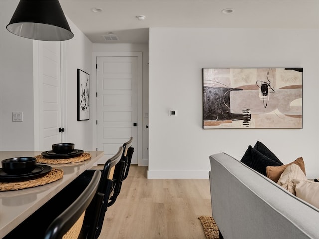1002 Gullett St Unit 2, Austin, TX 78702 - hall featuring light wood-style floors, baseboards, and recessed lighting
