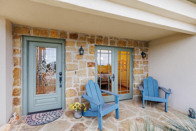 2900 Hi Mesa, Horseshoe Bay, TX 78657 - property entrance featuring stone siding and french doors