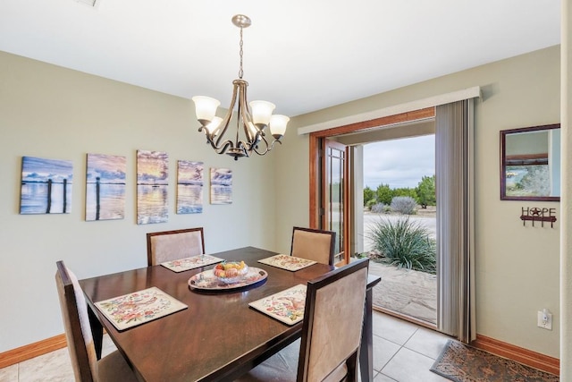2900 Hi Mesa, Horseshoe Bay, TX 78657 - dining room featuring an inviting chandelier, light tile patterned floors, and baseboards